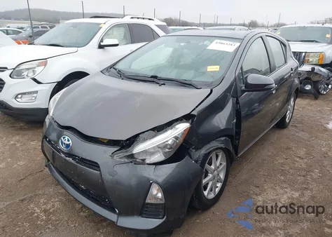 2014 Toyota Prius C Three z USA, uszkodzony, nr VIN JTDKDTB32E1572744